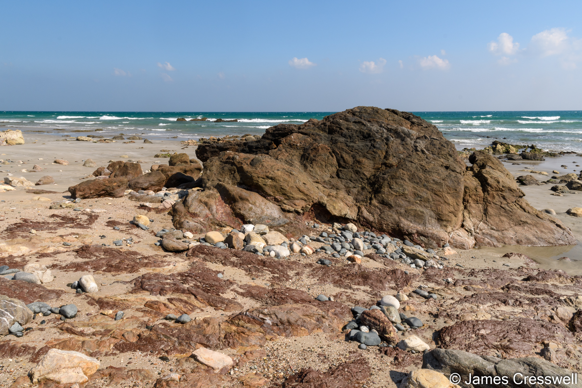 An outcrop of kimberlite on a beach