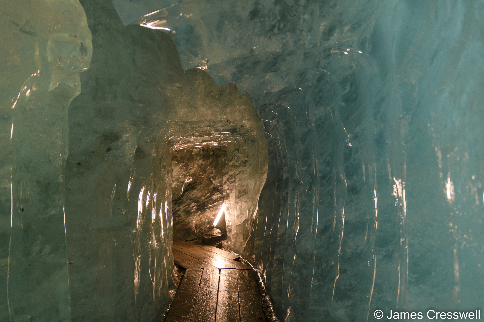 A tunnel through ice in a glacier