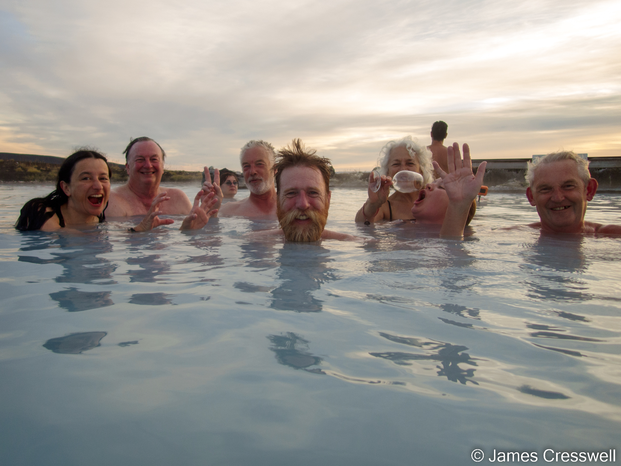 People in an outdoor swimming pool
